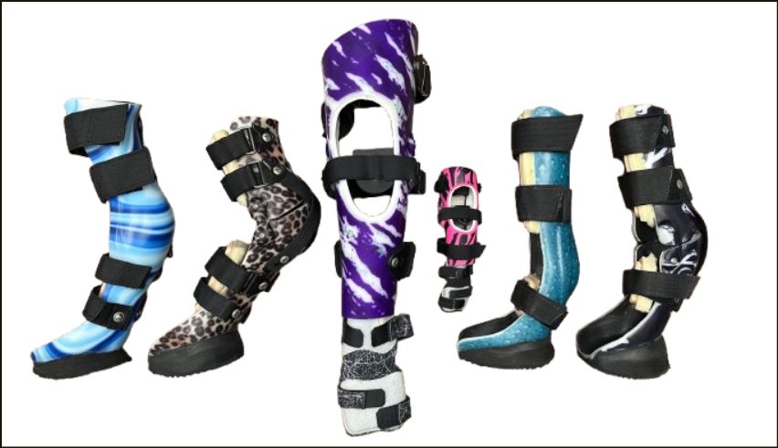 Six different custom dog leg braces in different colors and patterns are displayed